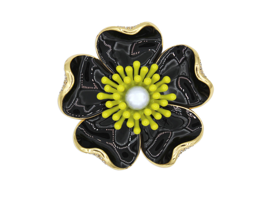 Anemone black brooch with yellow contrast center, pearl detail and gold accents. 