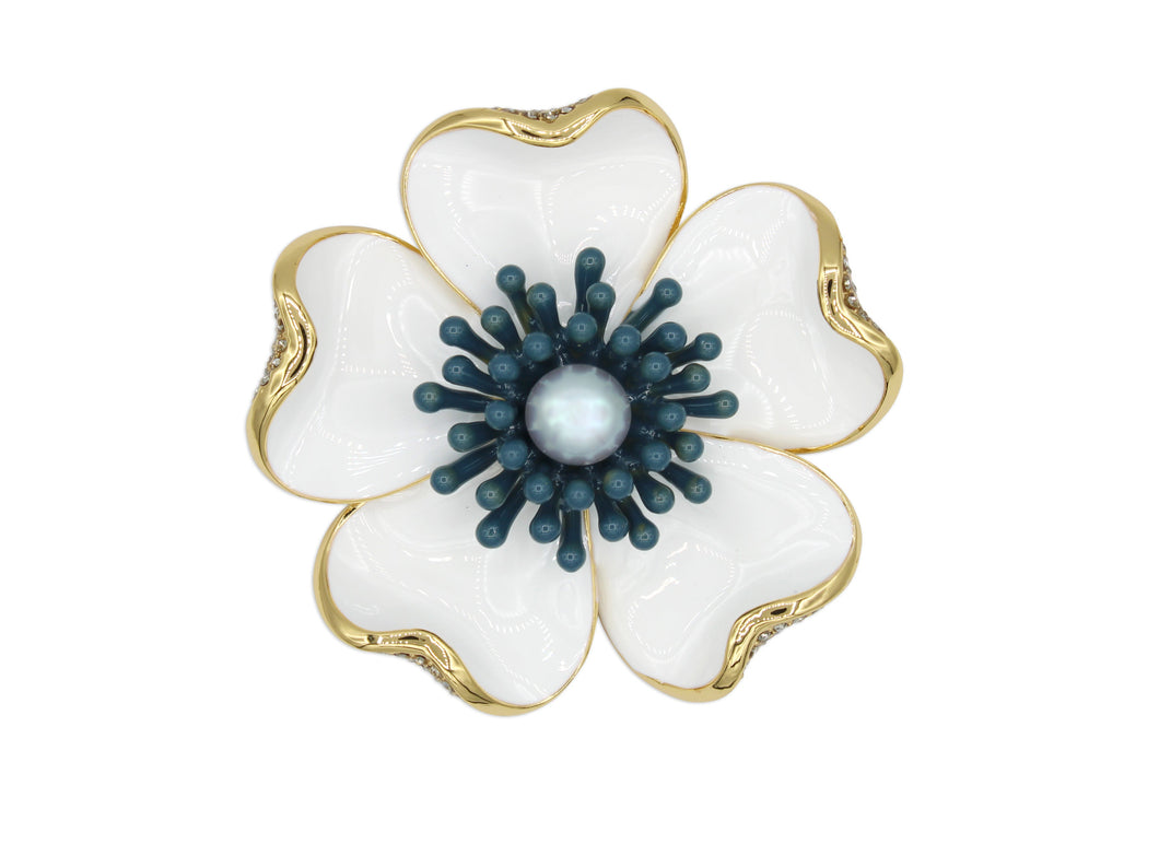 Anemone white brooch with blue contrast center, pearl detail and gold accents.